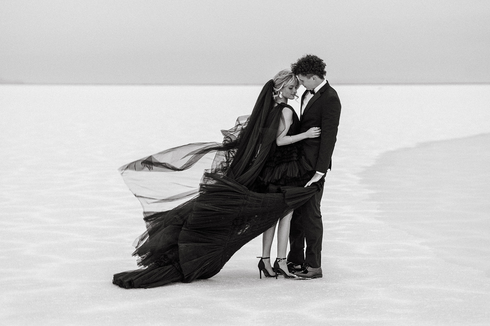 Bonneville Salt Flats Couple in a Black Dress and Tux  Salt Gowns