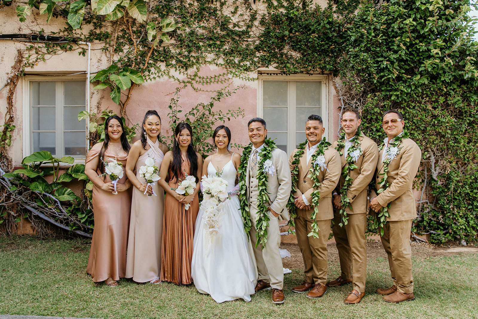 honolulu bridesmaid dresses This is a celebration in Hawaiian style. These tropical print bridesmaids  dresses! Gorgeous tropical flower bridal bouquet and Monstera leaf  bridesmaids bouquets!! I love that all ladies are barefoot  Photography  @emilyturner