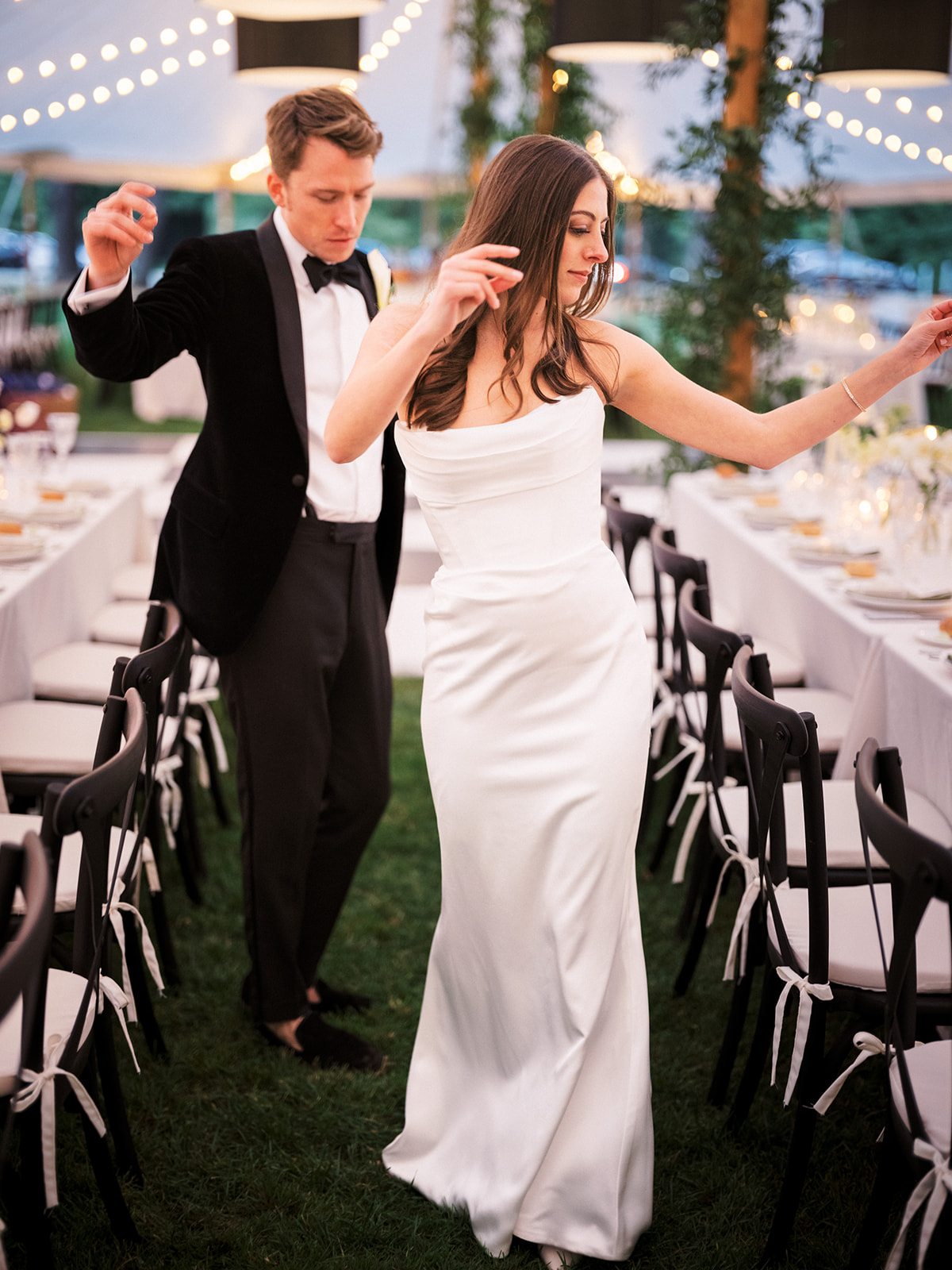 Bride and groom dance in their reception space.