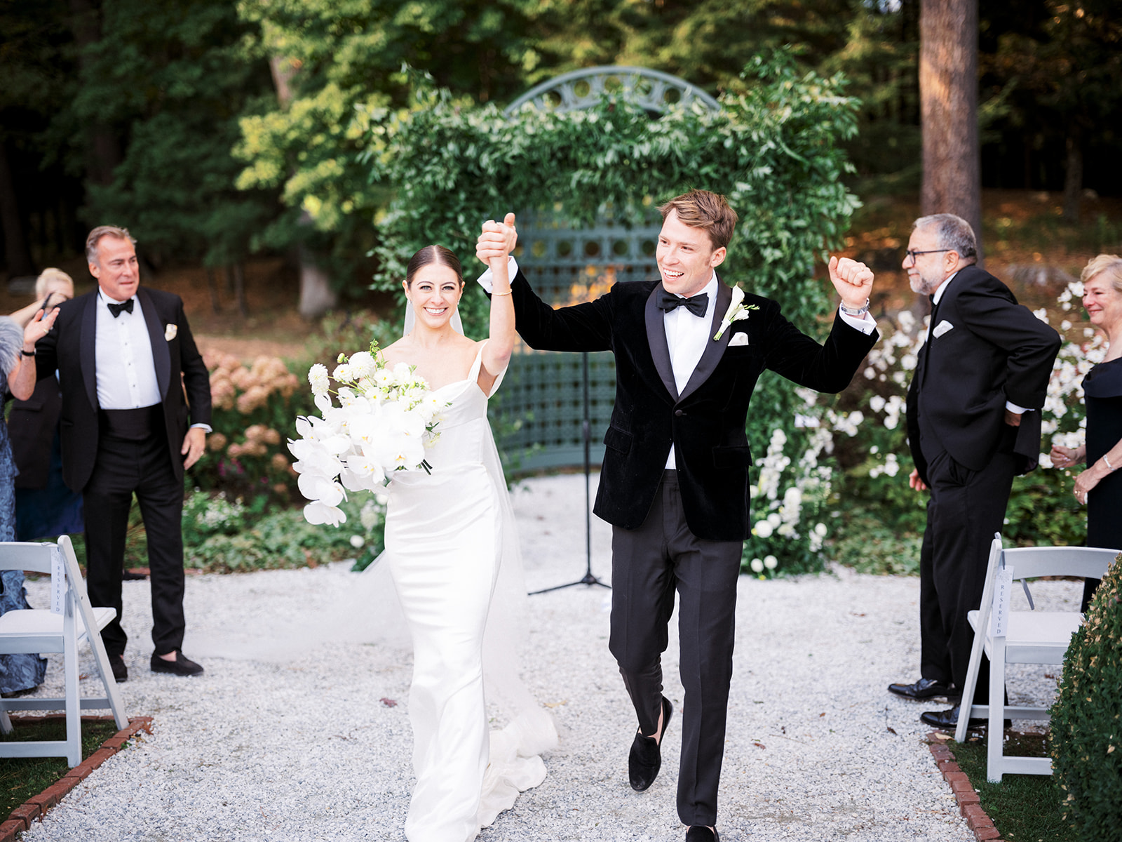 Bride and groom walking down the aisle.