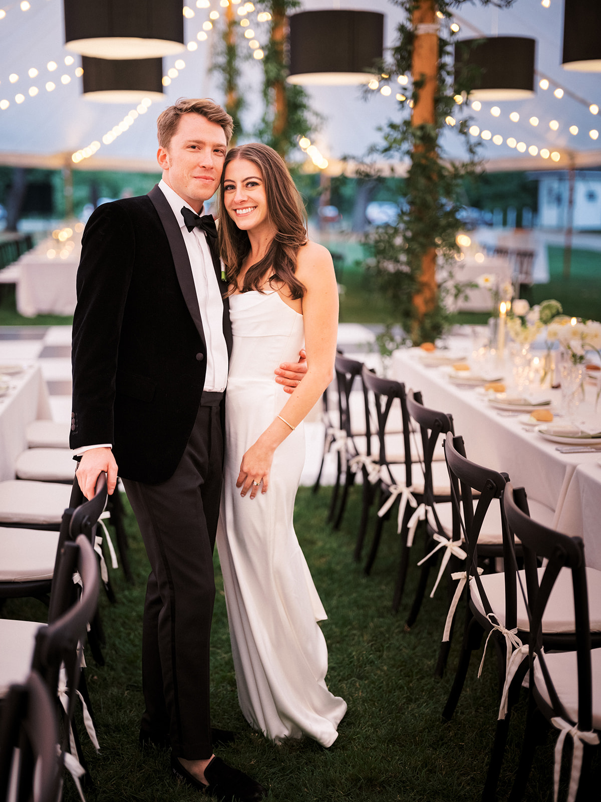 A classic portrait of the bride and groom in their reception space.