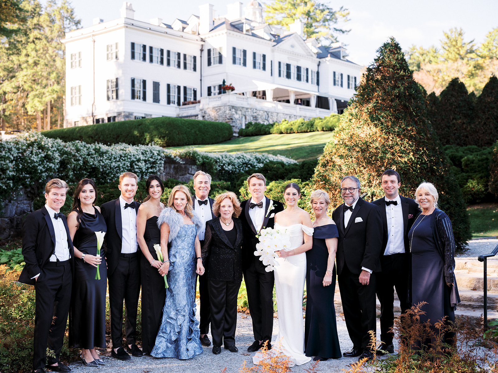 Elegant family portrait in front of The Mount.