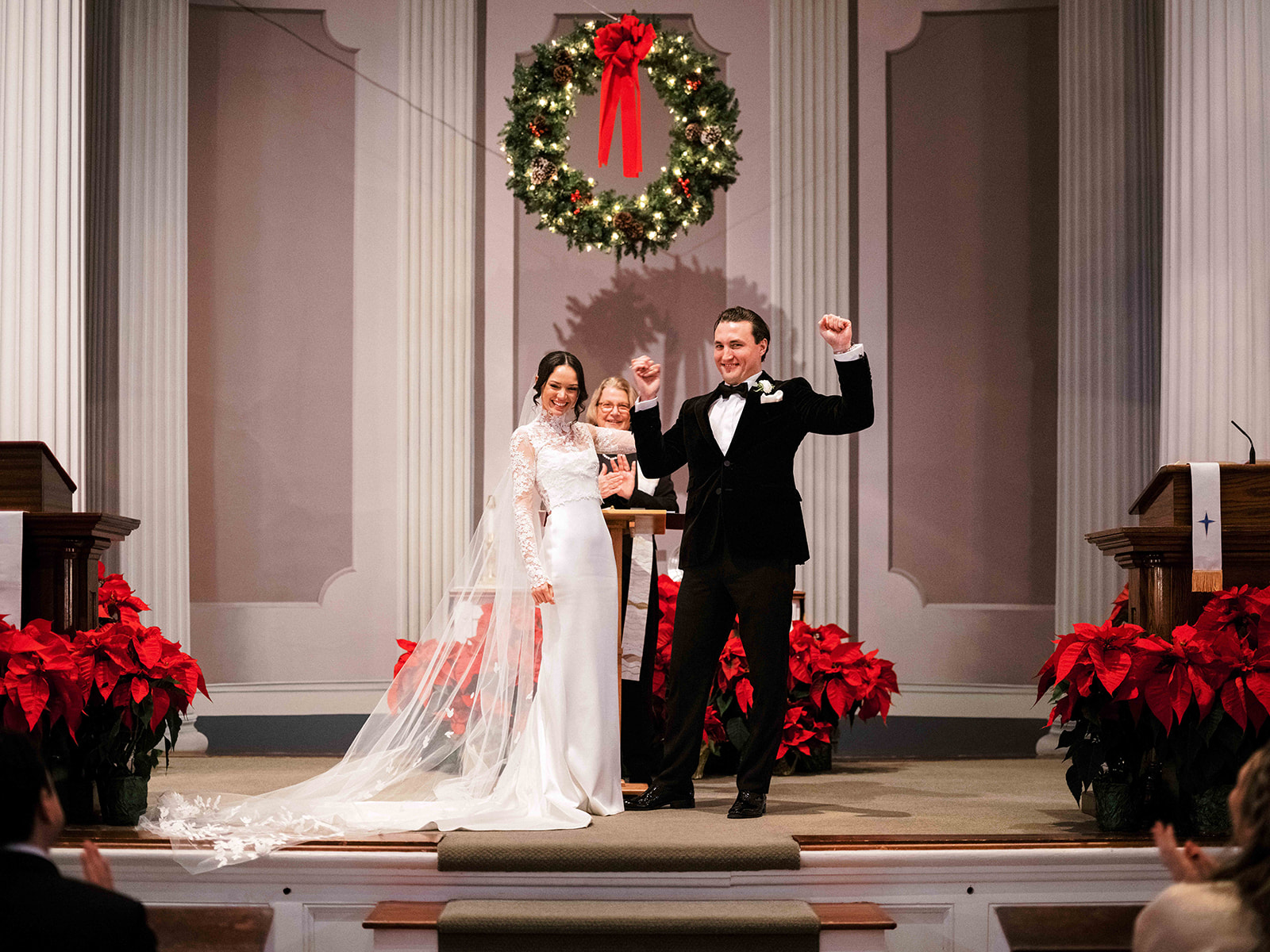 Bride and groom excited after getting married.