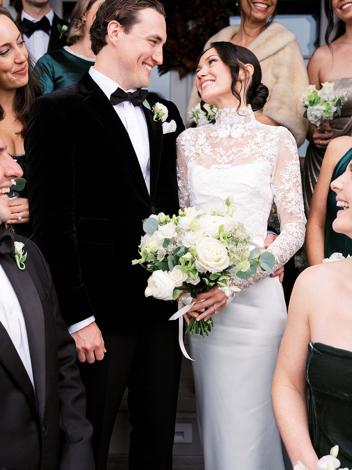 Bride and groom look at each other.