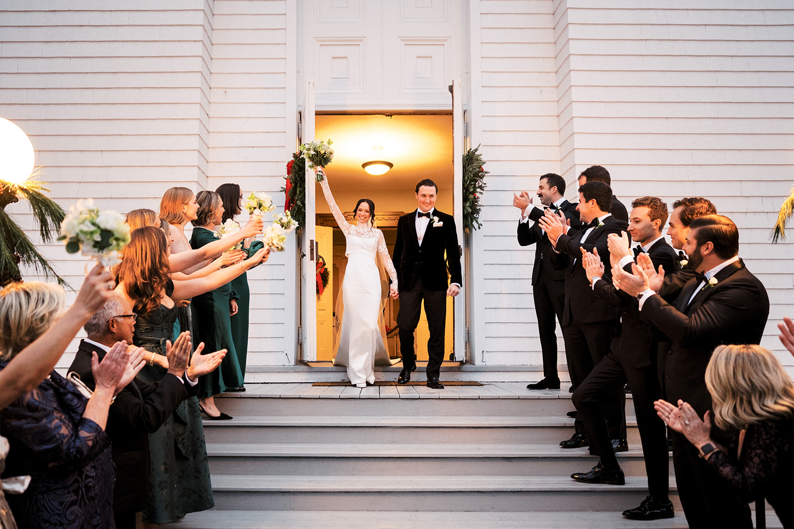 Bride and groom walking down steps.