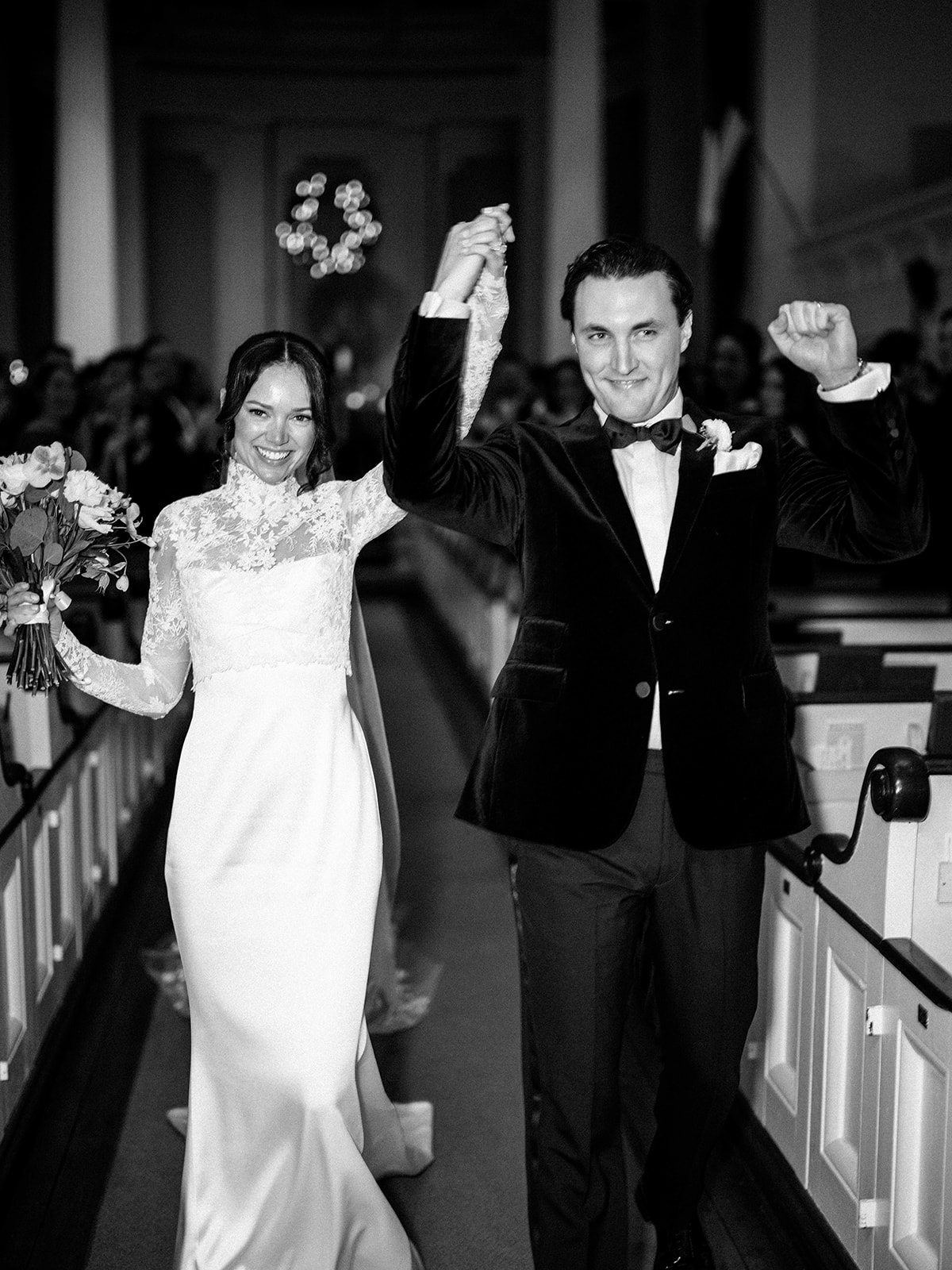 Bride walking down aisle with groom.