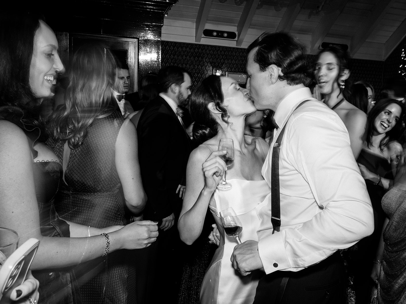 Candid moment of guests laughing and dancing late into the night.