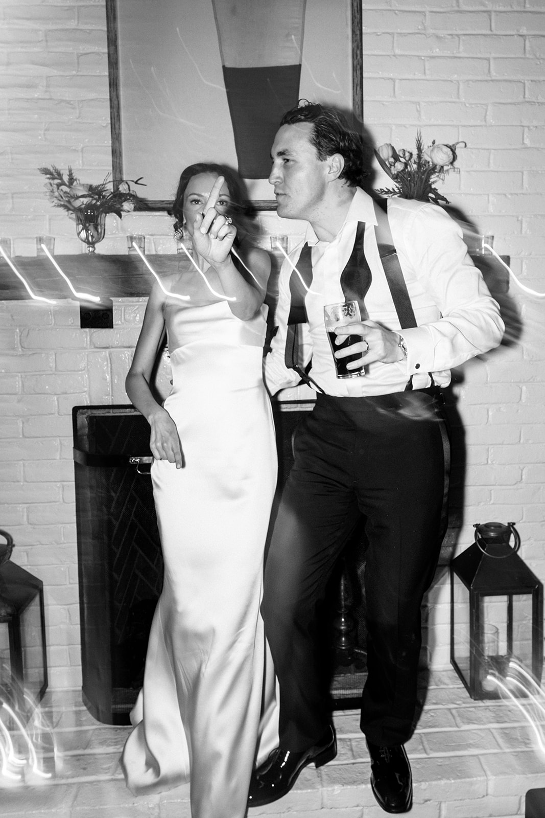 Couple dancing in black-and-white photo as the night winds down.