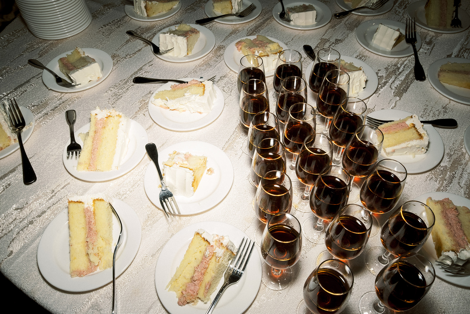 Reception dessert display with chocolate treats and elegant plating.